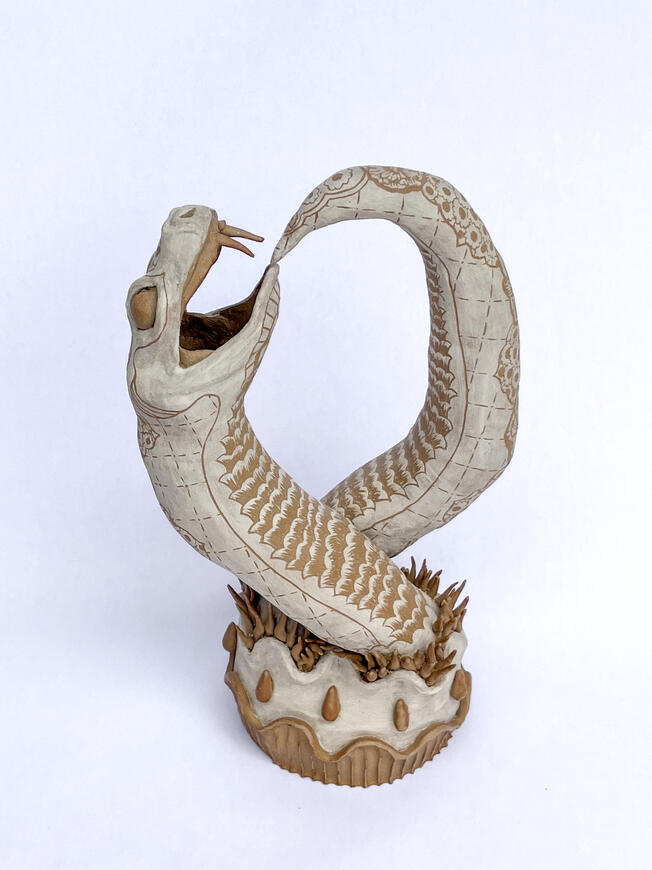 Sarah Alonzo Artist - Ceramics Earth tone ceramic snake eating its own tail sculpture with sgraffito details. Ouroboros