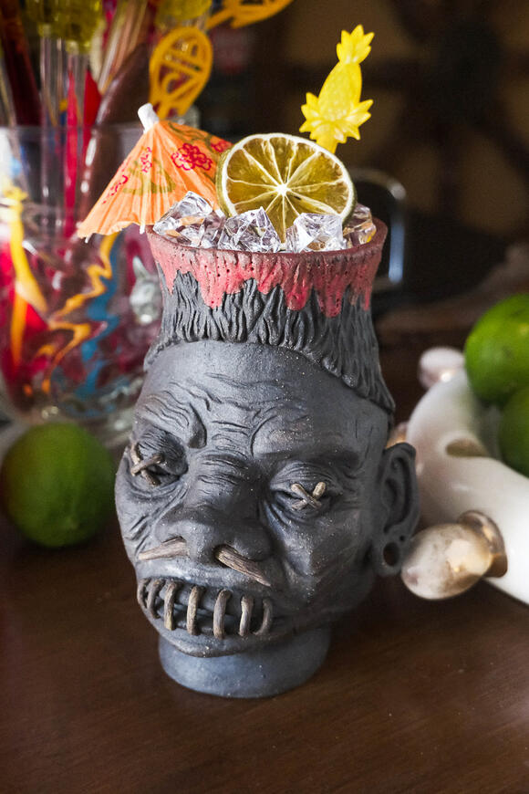 Sarah Alonzo Artist - Ceramics handmade ceramic tiki mug, shrunken head, piercings, lava, cocktail